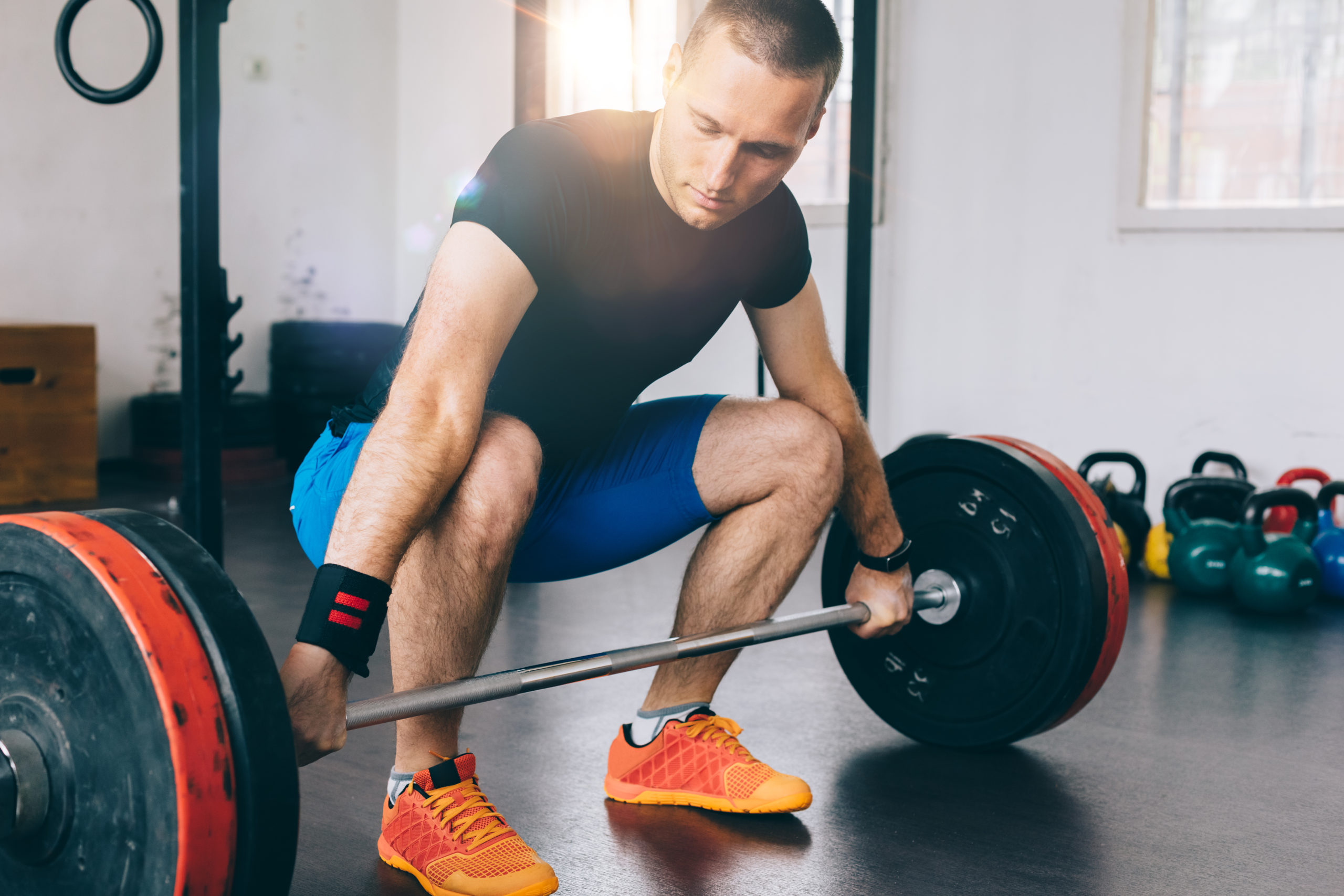 Bodybuilder weightlifting in the gym